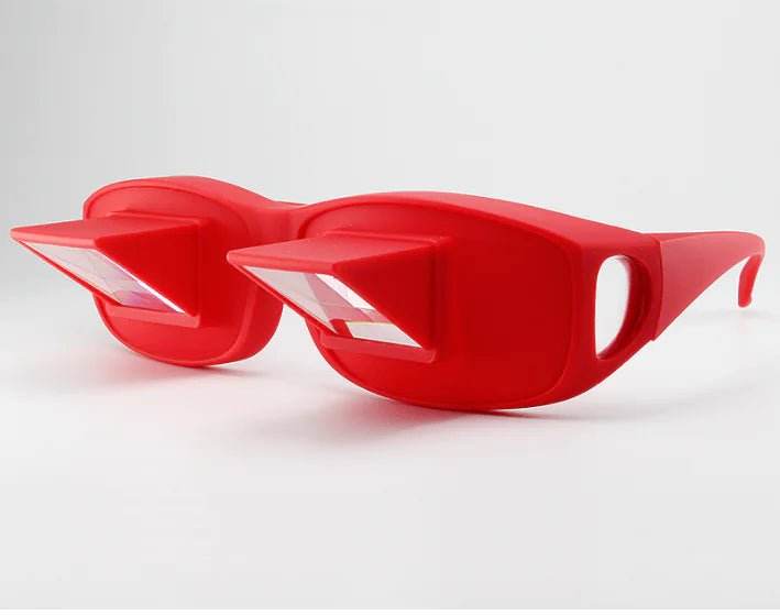 Red prism glasses with angular lenses on a white background