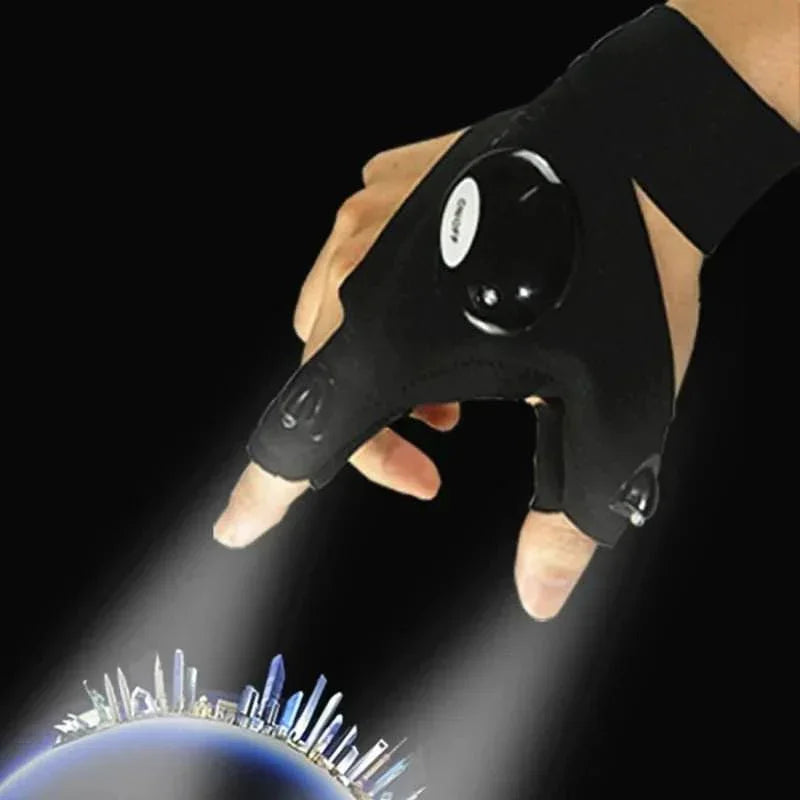 LED flashlight gloves shining light onto a city skyline against a black background