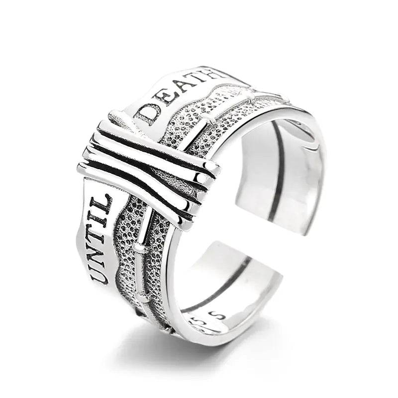 Silver gothic ring with 'UNTIL DEATH' engraving and textured band design