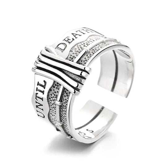 Silver gothic ring with 'UNTIL DEATH' engraving and textured band design
