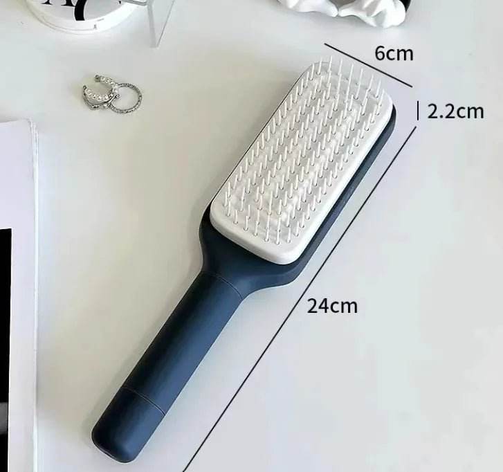Rectangular black and white hairbrush with handle, measurements 24cm x 6cm x 2.2cm